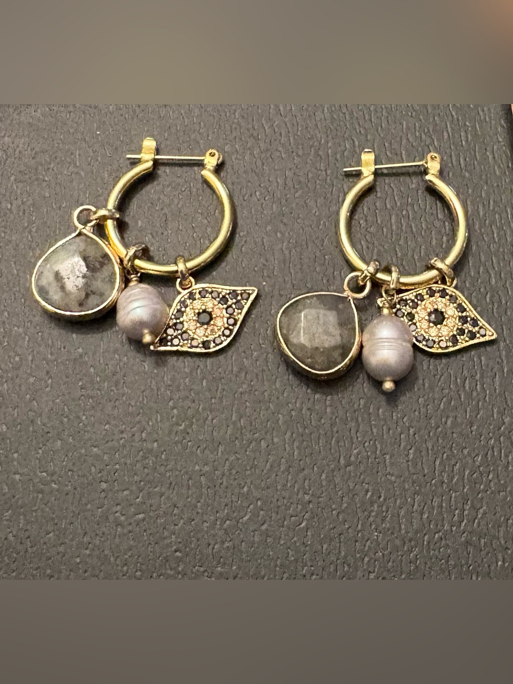 Lucky Brand gold hoops with 3 attractive charm dangles